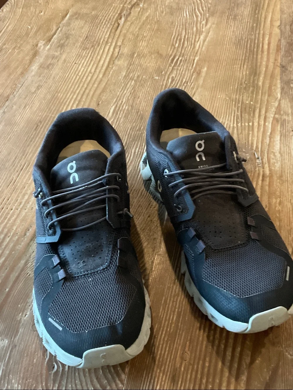 On Running Women’s Athletic Shoes in Black and Cream